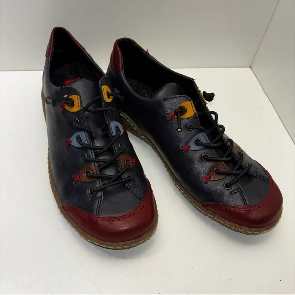 Rieker Liv 61 (L7561) sneakers in navy blue, red, and brown color block - Picture 1 of 11